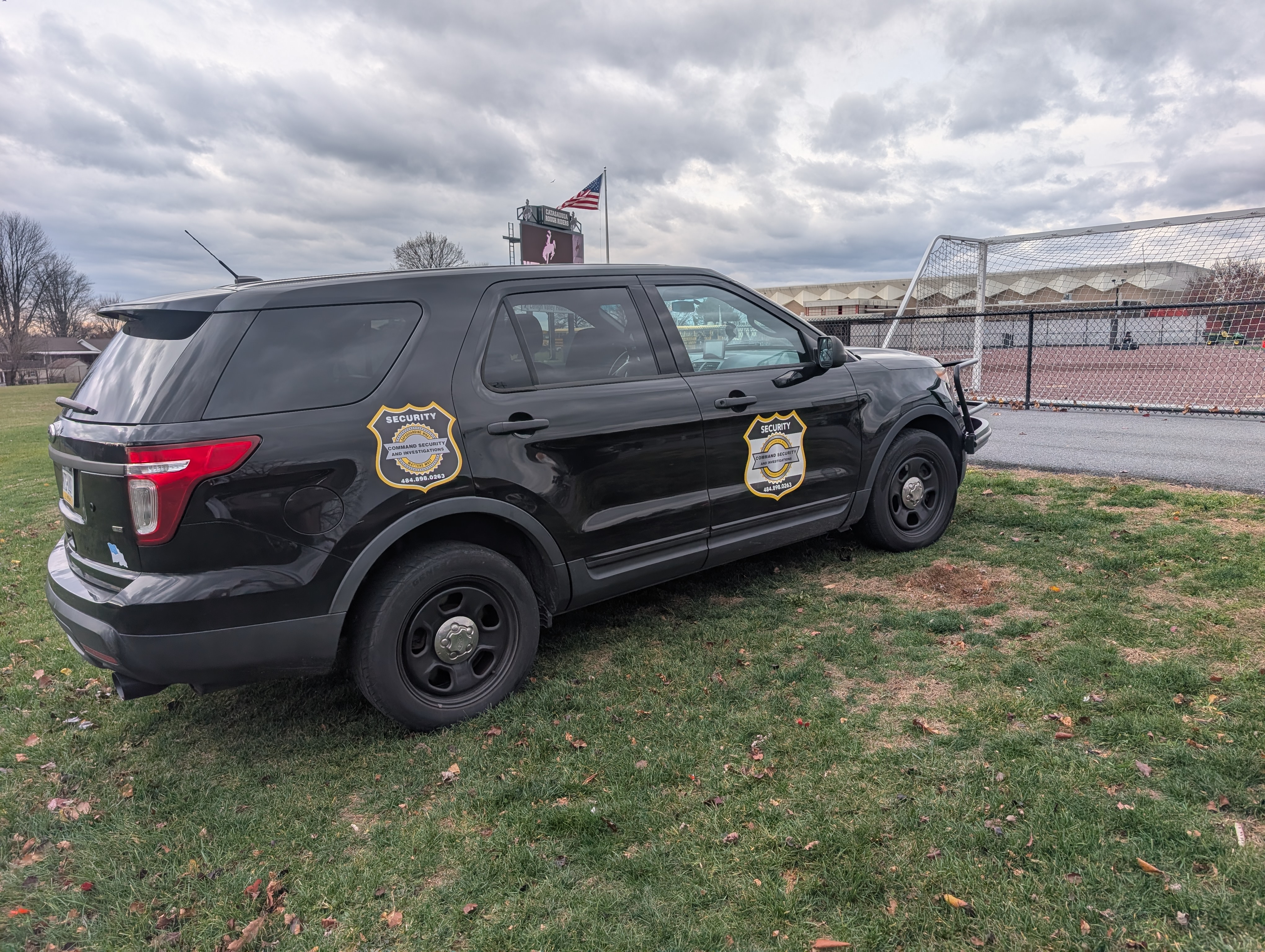 Command Security patrol vehicle with American flag